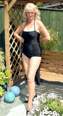 Blonde granny in black stockings,