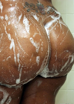 Fatty black hottie in soap foam