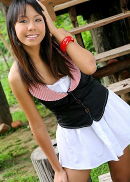 Leggy asian teen in little white skirt